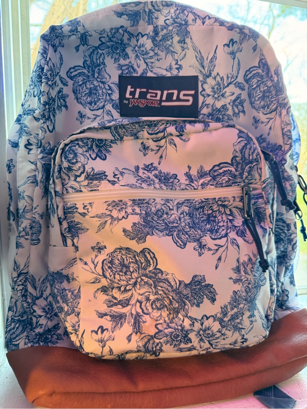 Jansport Trans Floral Backpack in White and Navy